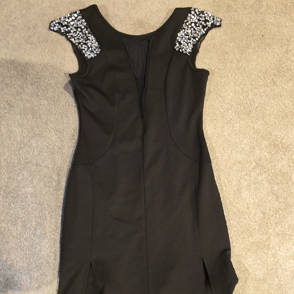 Elegant Black Dress with Embellished Shoulders